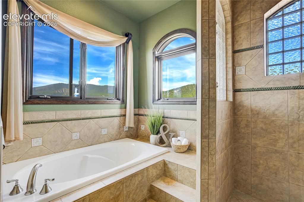 Image 30 of 50: Soaking Tub and Rain Shower