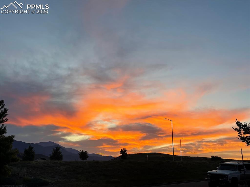 Image 30 of 31: Sunset from the front porch