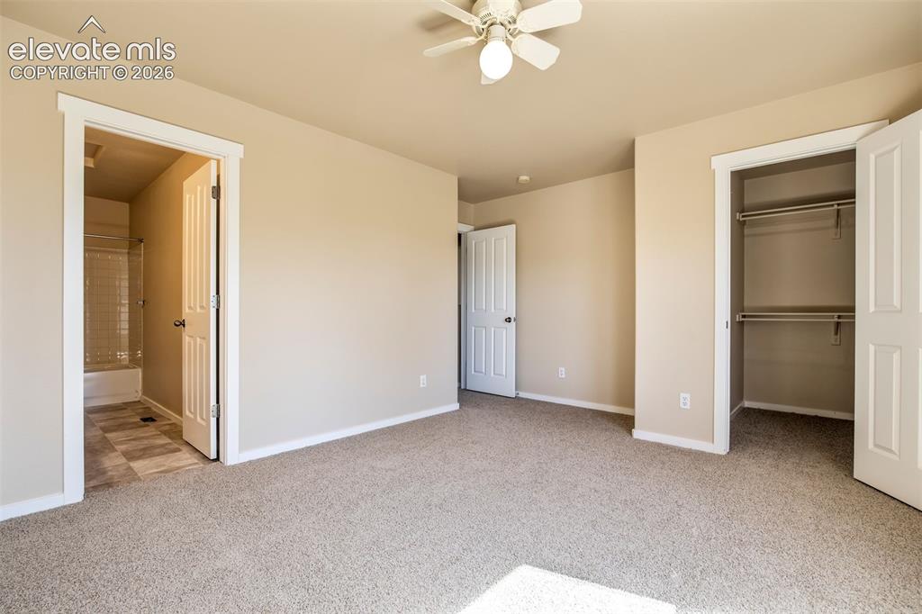 Image 18 of 34: Primary Bedroom with private bath