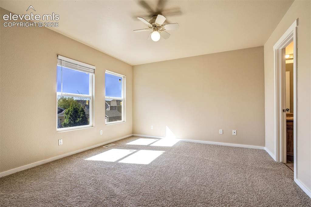 Image 19 of 34: Upper Primary bedroom has 2 windows for natural light
