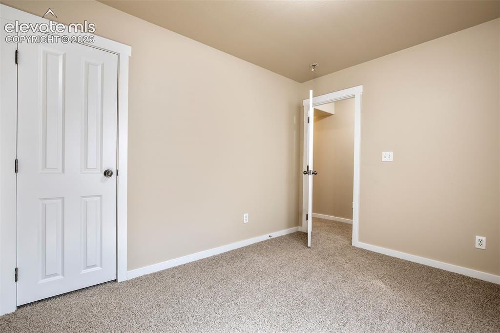 Image 26 of 34: Basement 3rd bedroom