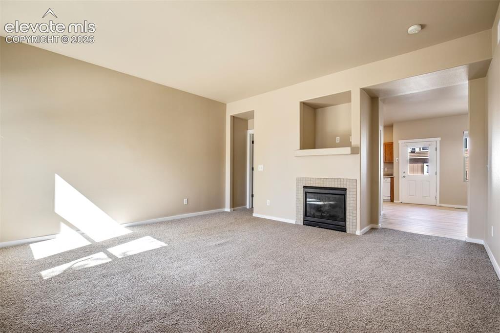 Image 9 of 34: Cozy gas fireplace 