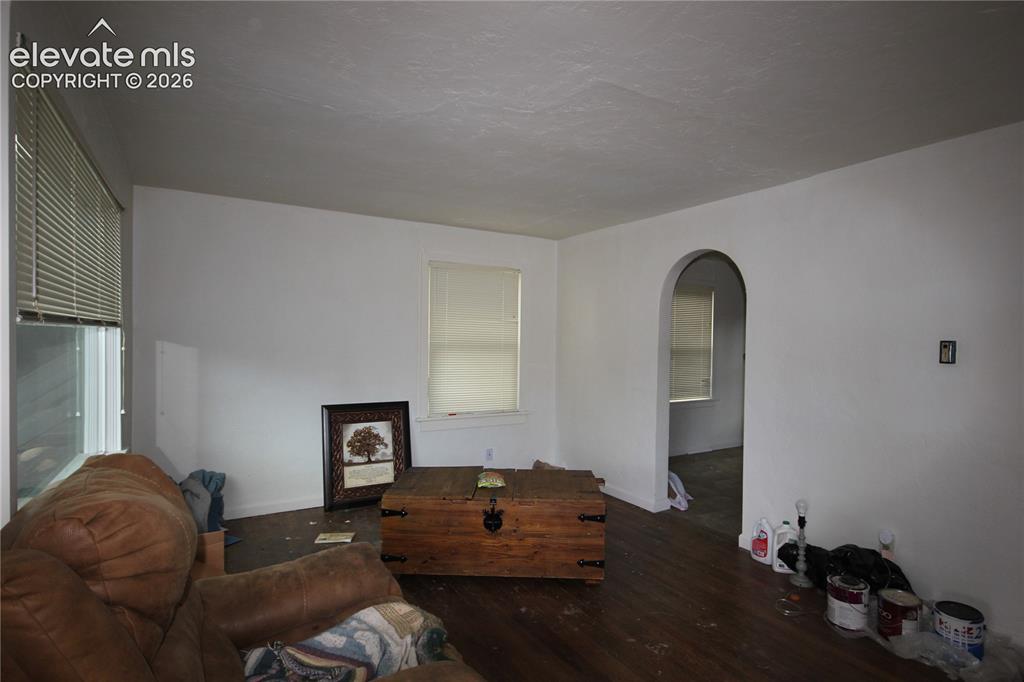 Image 11 of 26: Wood floors in living room