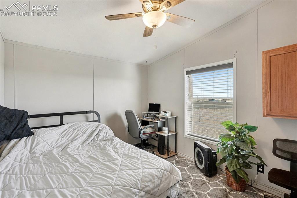 Image 12 of 15: Additional bedroom with LVP flooring