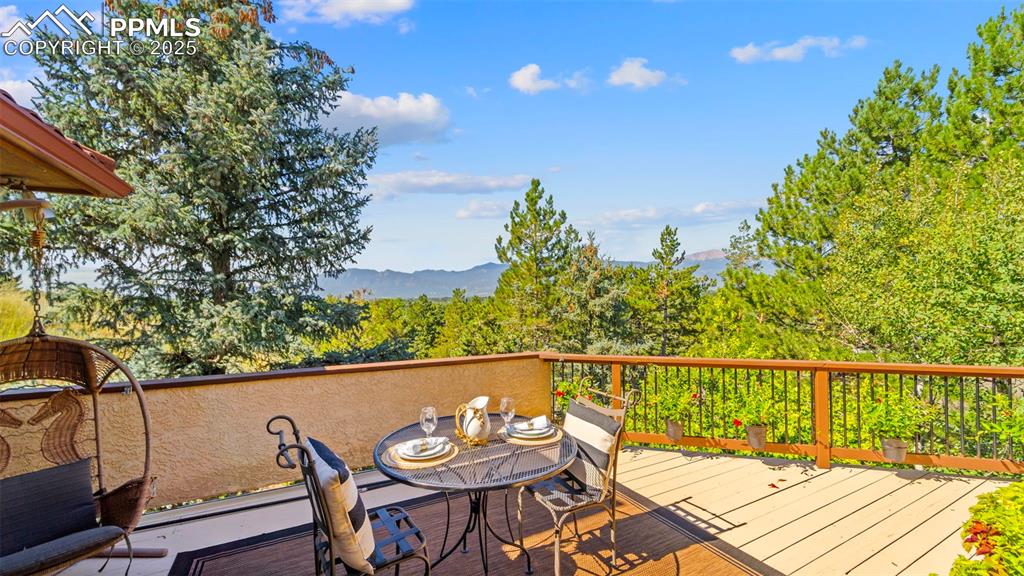 Image 23 of 46: A serene wraparound balcony offers unparalleled peace, creating the feeling