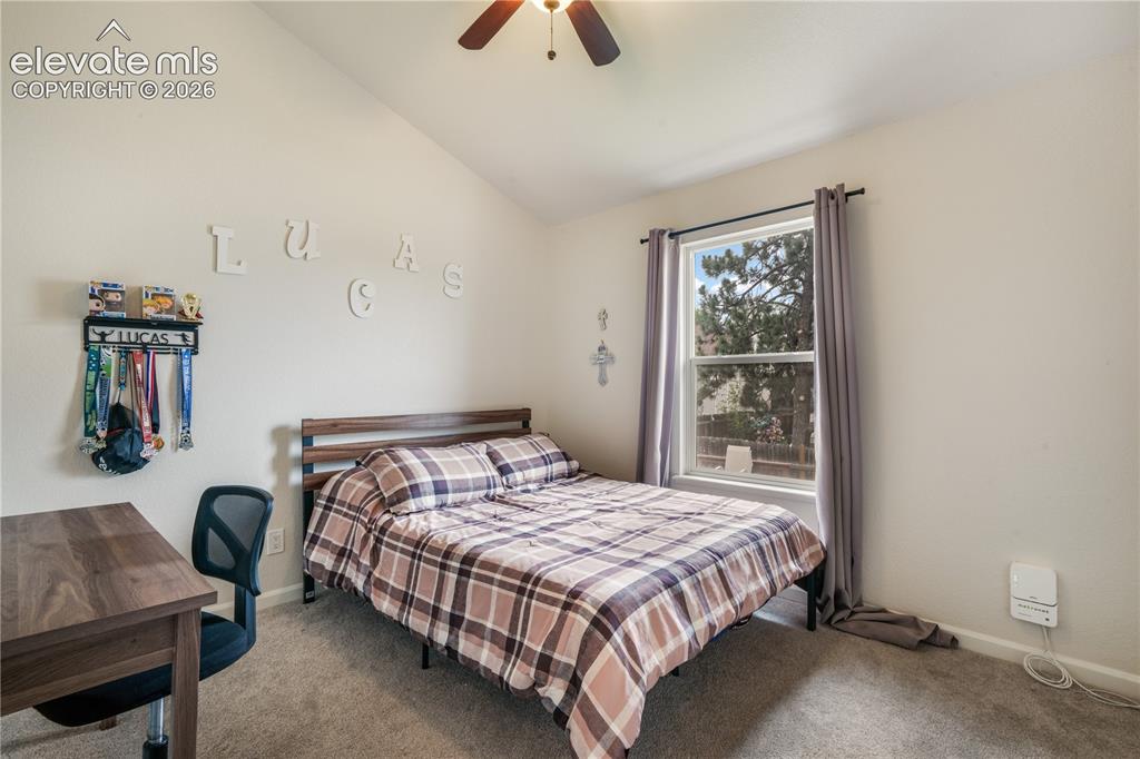 Image 21 of 50: Upper Level Bedroom with Carpet