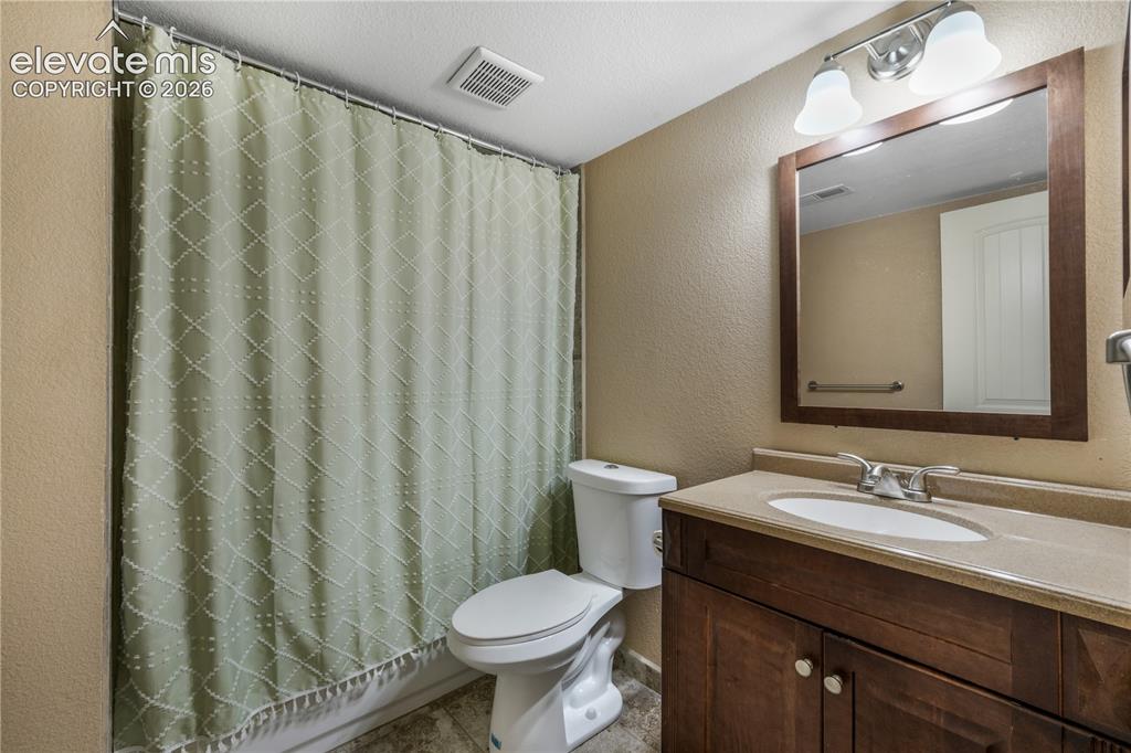 Image 36 of 50: Lower Level Full Bathroom