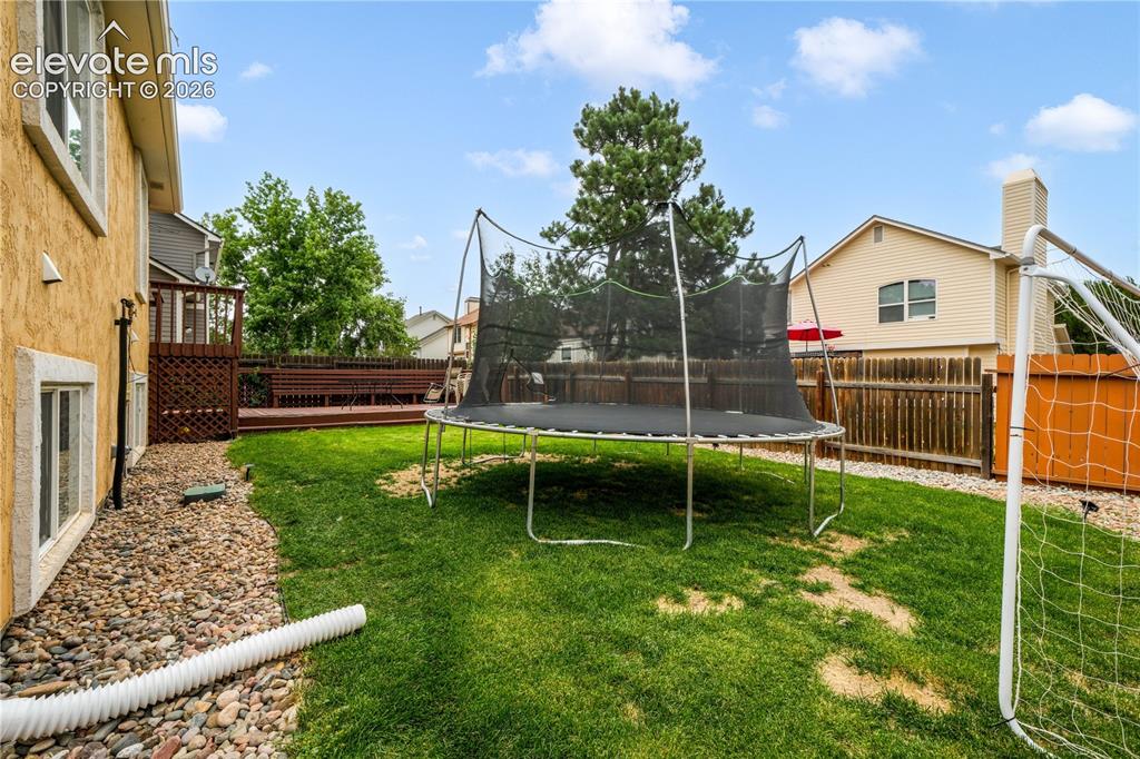 Image 44 of 50: Spacious Backyard