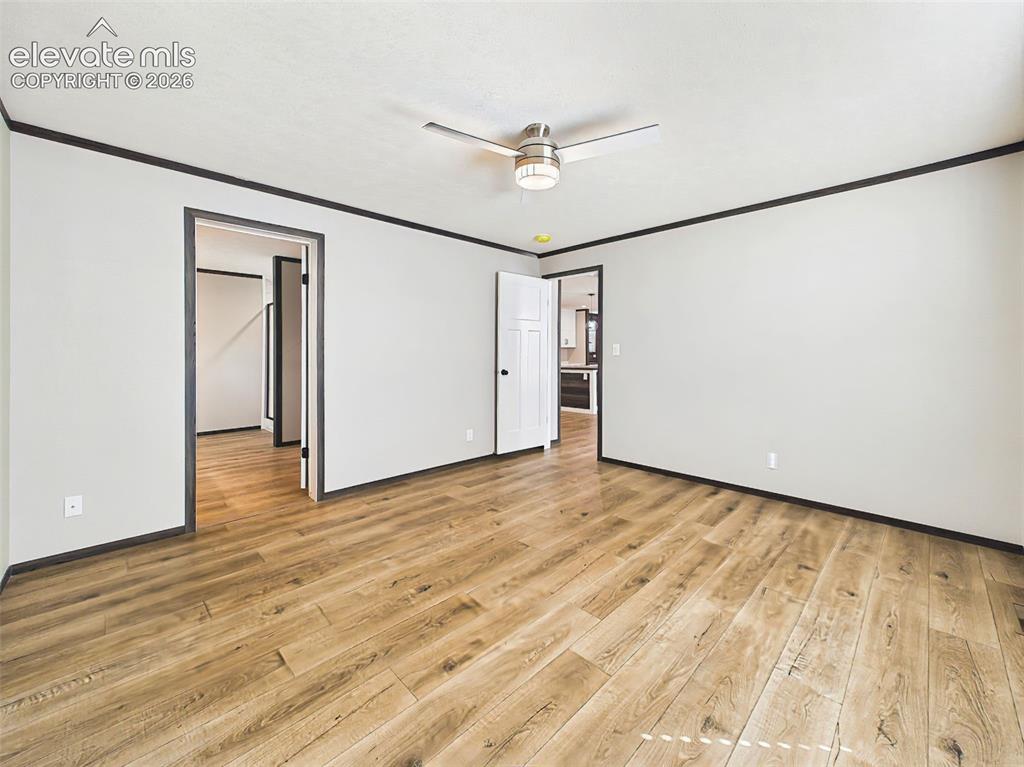 Image 29 of 50: Primary Bedroom – Alternate view of the spacious primary suite highlighting