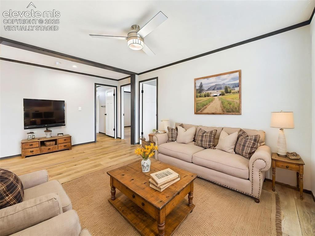 Image 36 of 50: (Virtually Staged) Family Room – Alternate view of the inviting Family room