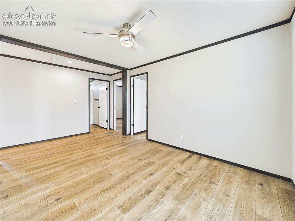Image 37 of 50: Family Room – Alternate view showcasing the generous proportions, neutral f