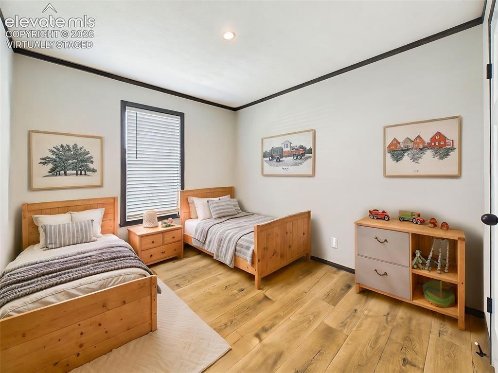 Image 40 of 50: (Virtually Staged) Bedroom 3– Spacious secondary bedroom with room for mult