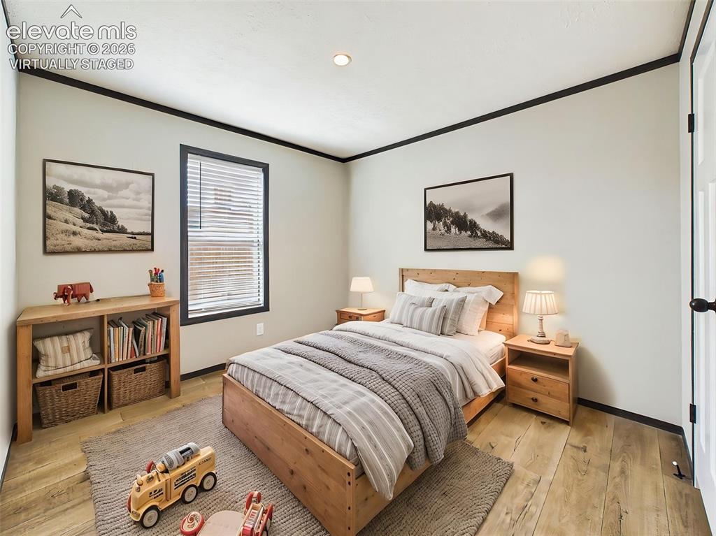 Image 42 of 50: (Virtually Staged) Bedroom 4 – Inviting secondary bedroom with abundant nat