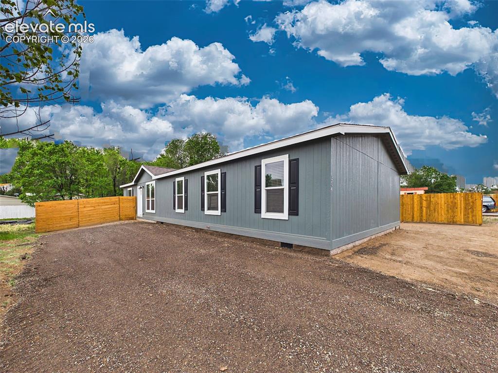 Image 46 of 50: Fresh exterior with modern siding, attractive curb appeal, and convenient a