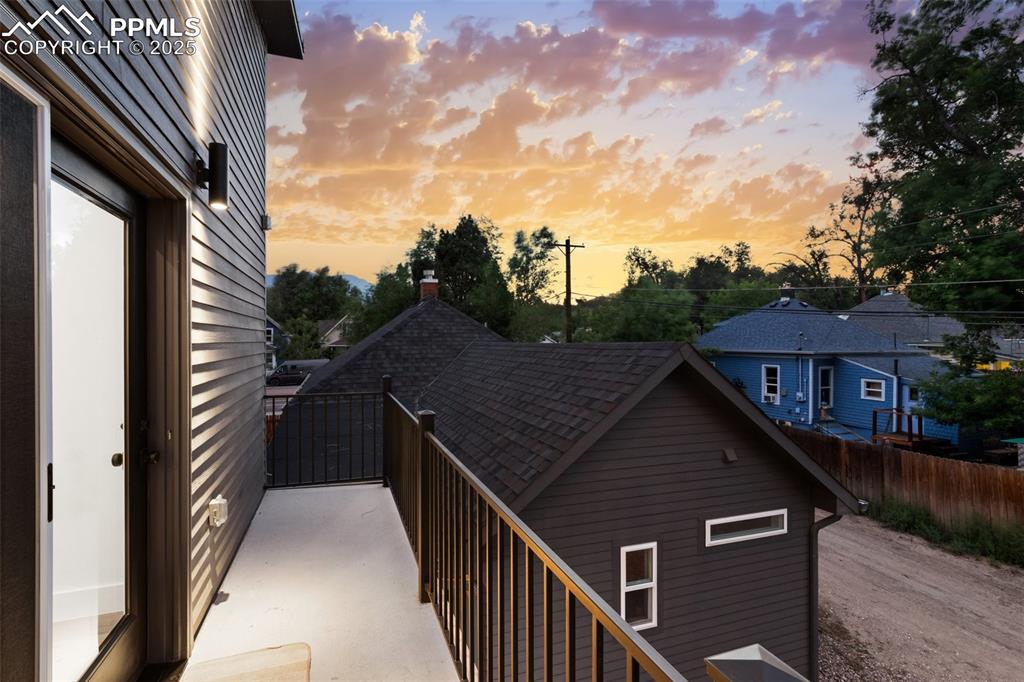 Image 34 of 38: View of balcony at dusk