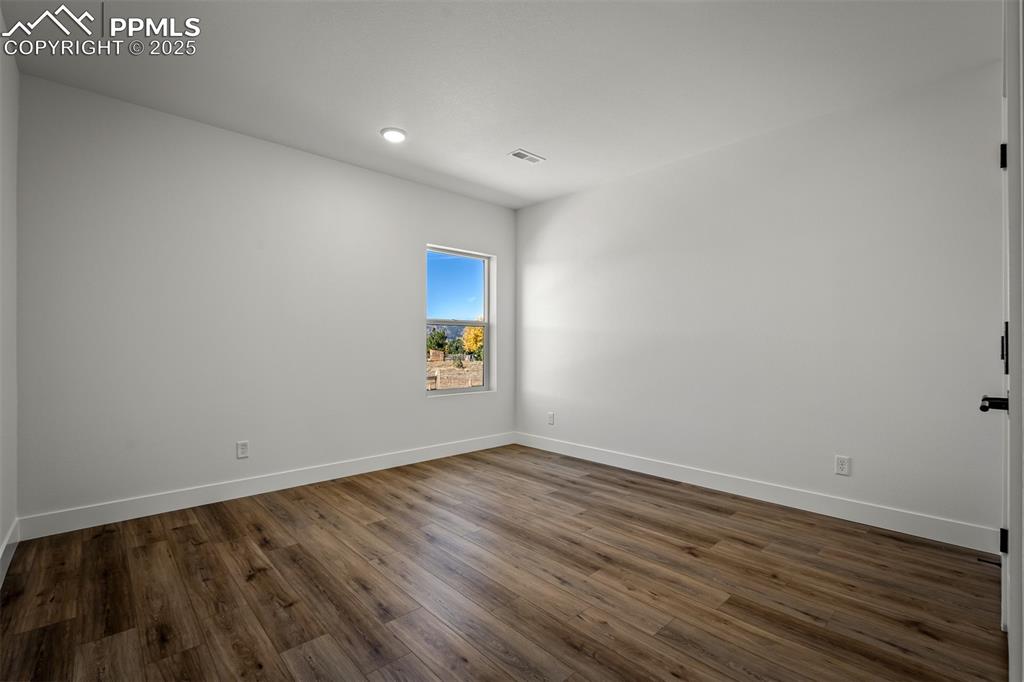 Image 32 of 38: Bedroom