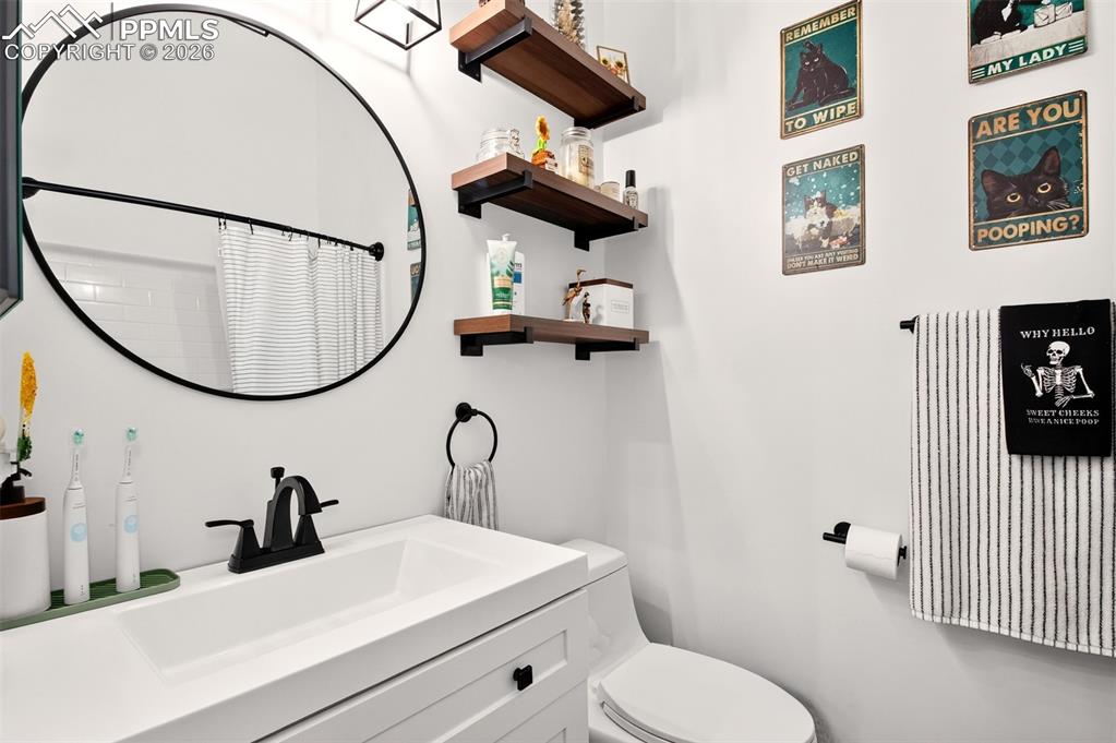 Image 13 of 17: Beautifully updated bathroom. 