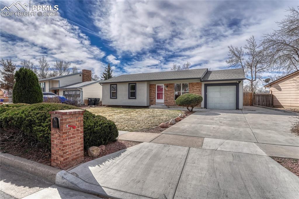 Image 2 of 49: Expanded driveway great for RV parking