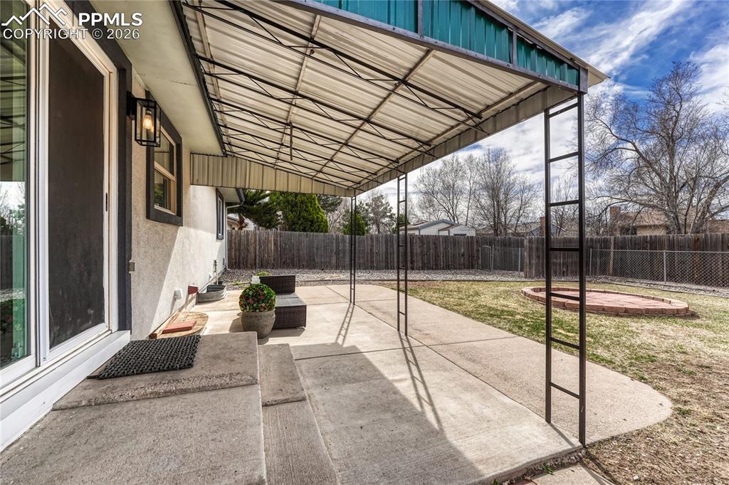 Image 33 of 49: Covered patio