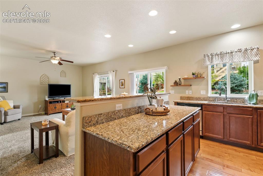 Image 10 of 27: Kitchen featuring stainless appliances and granite countertops