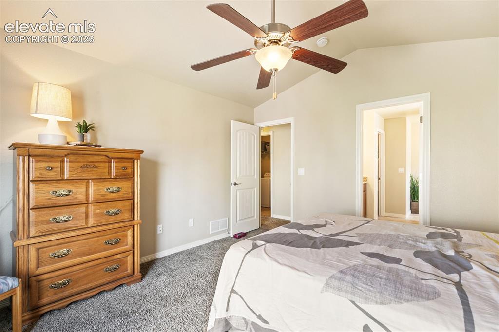Image 15 of 27: Primary bedroom with en-suite bathroom and walk-in closet