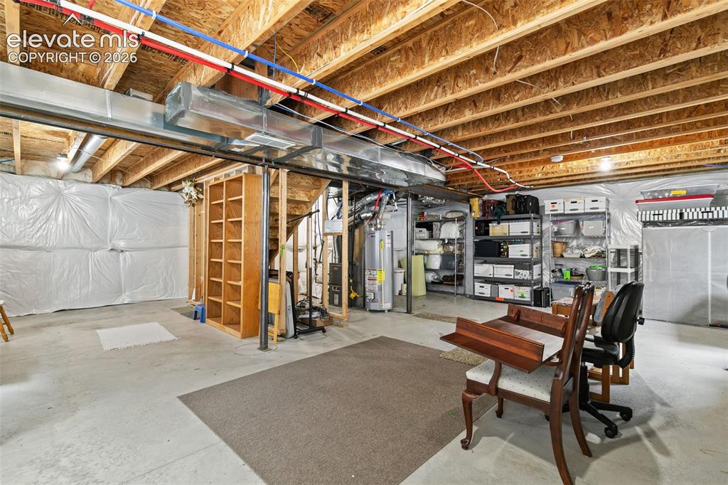 Image 22 of 27: Large unfinished basement
