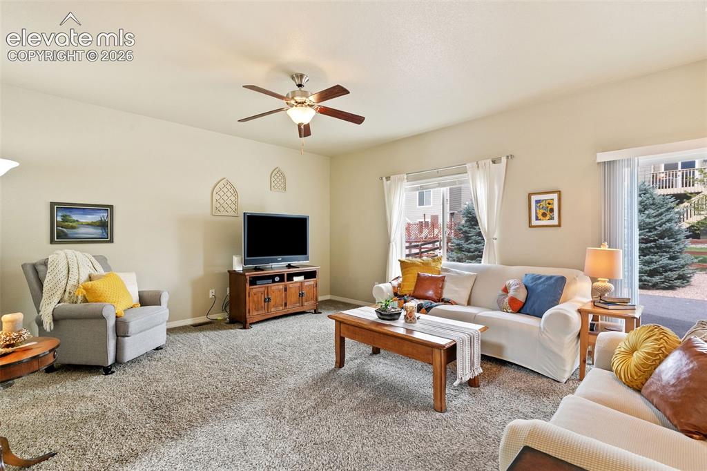 Image 6 of 27: Welcoming living room