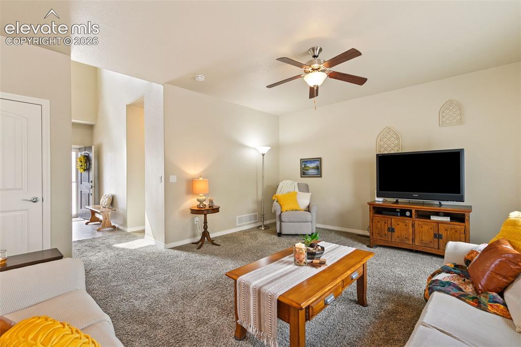Image 7 of 27: Welcoming living room
