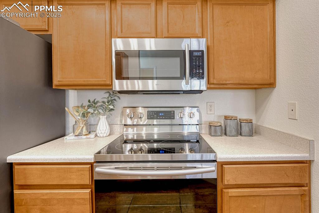 Image 17 of 27: Kitchen featuring stainless steel appliances