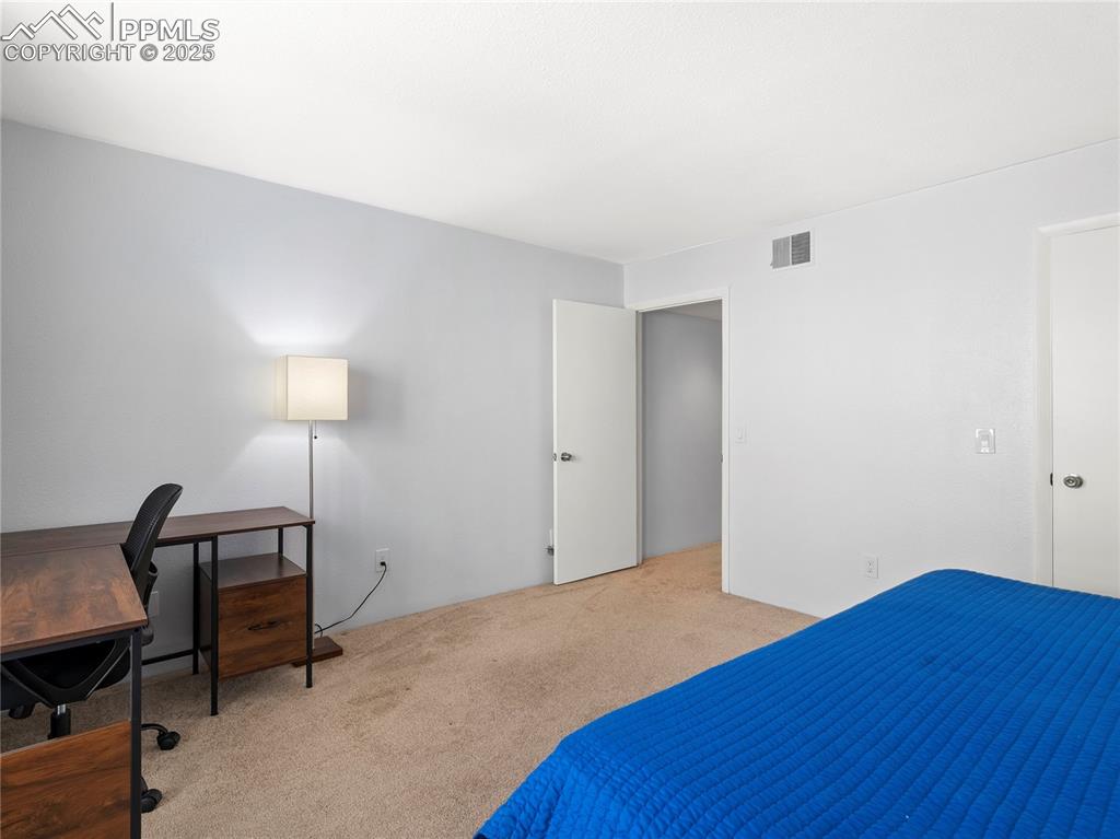 Image 18 of 49: Bedroom