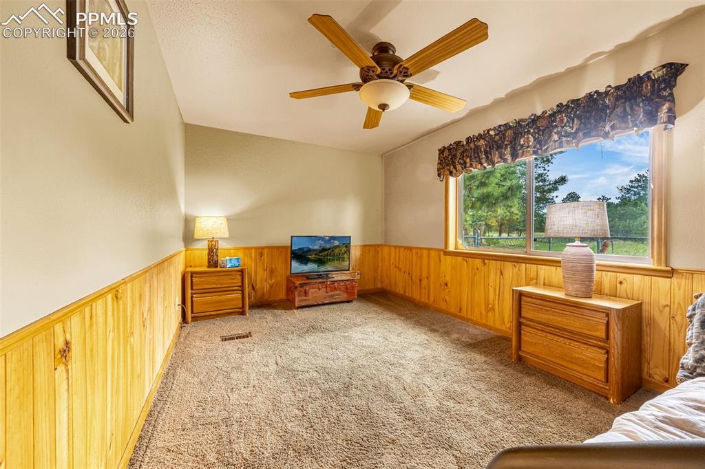 Image 21 of 36: Bonus room - currently set up as a NC bedroom. 