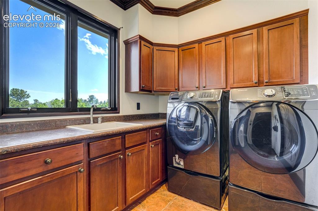 Image 26 of 50: Main level laundry space.