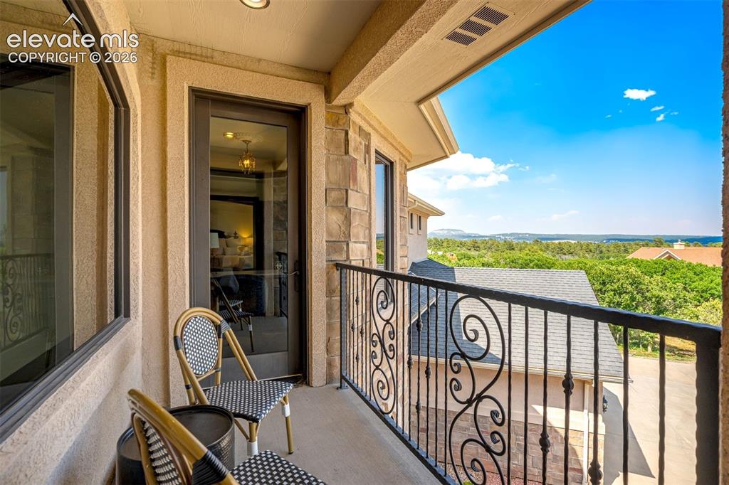 Image 31 of 50: Private balcony. Mountain air. Downtown Monument below. A remarkable way to