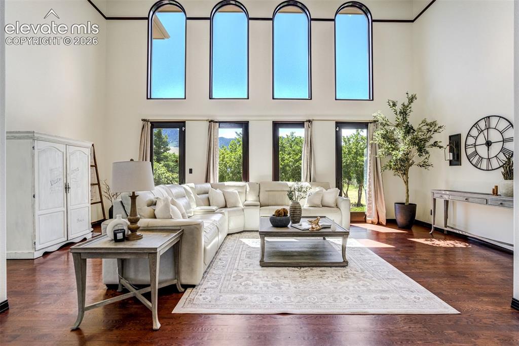Image 9 of 50: Soaring ceilings, walls of glass, and views that politely steal the convers