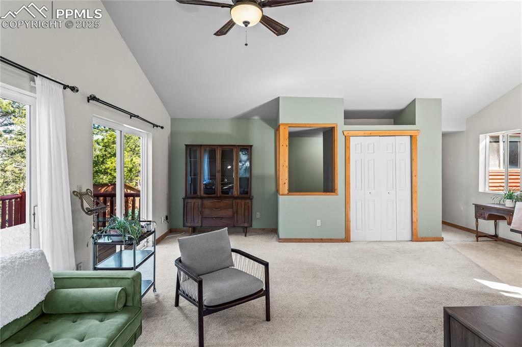 Image 11 of 39: Living area with closet space