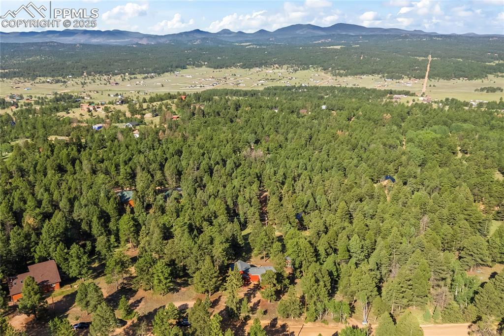 Image 28 of 39: View of property location with a mountainous background