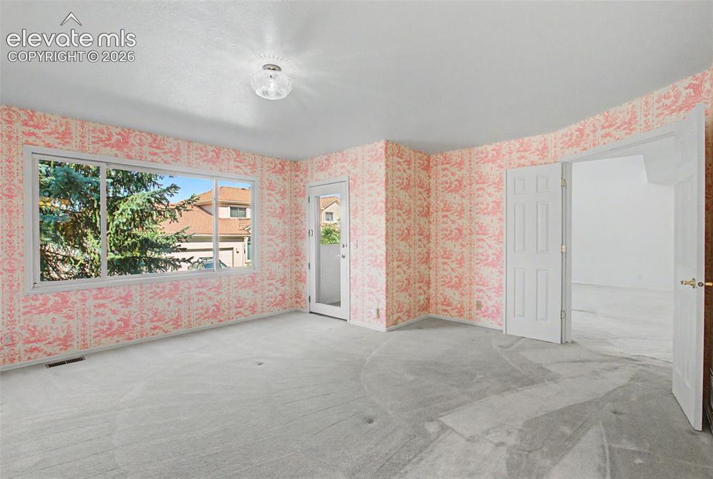 Image 19 of 39: Master Bedroom