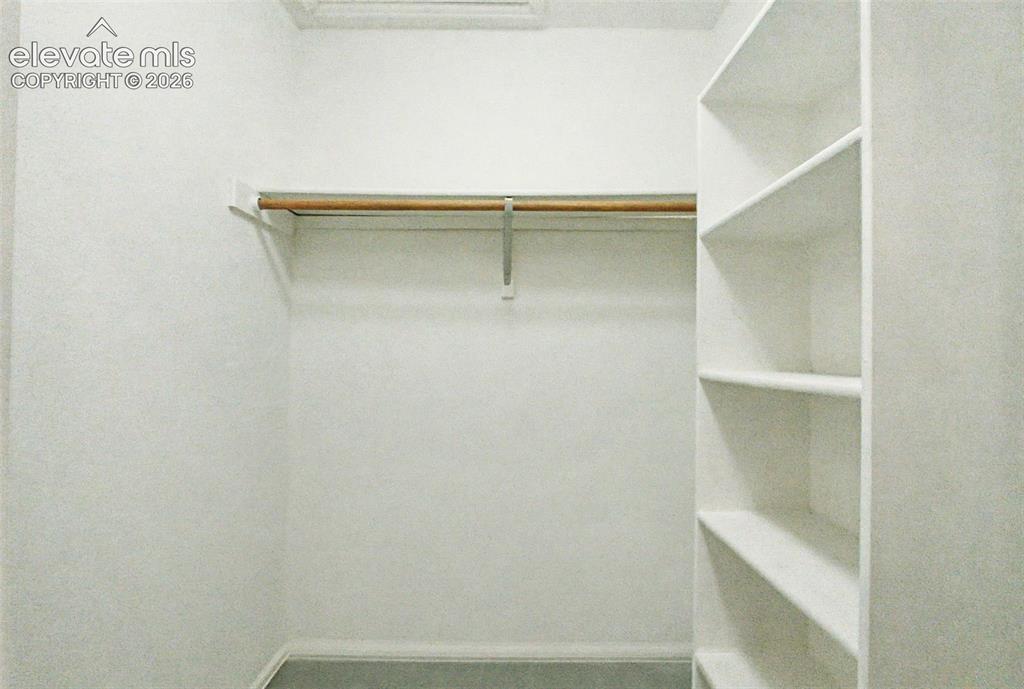 Image 27 of 39: Walk-In Closets
