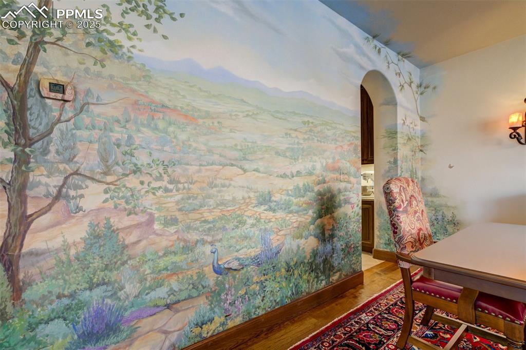 Image 15 of 50: Hand painted mural in formal dining area