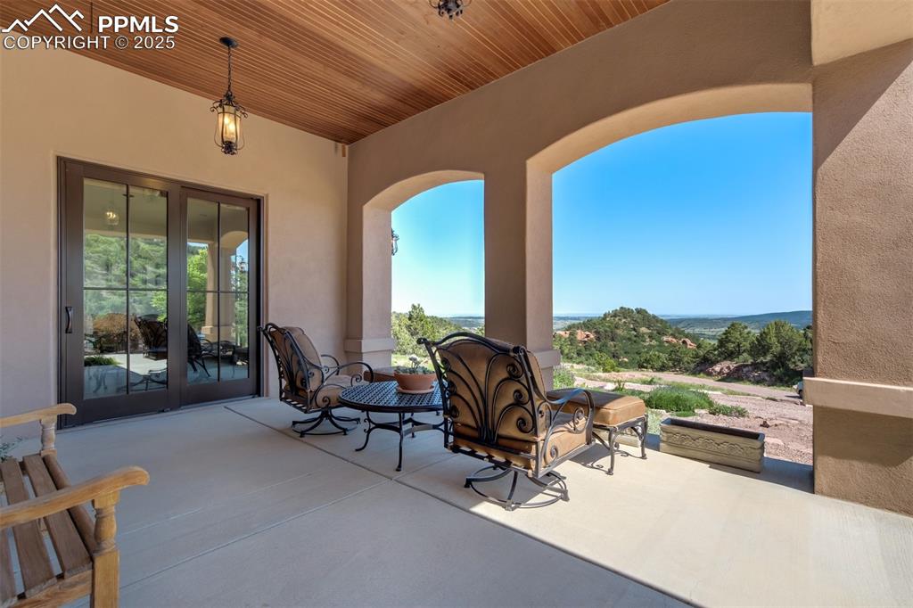 Image 45 of 50: Front veranda, located off of the kitchen.