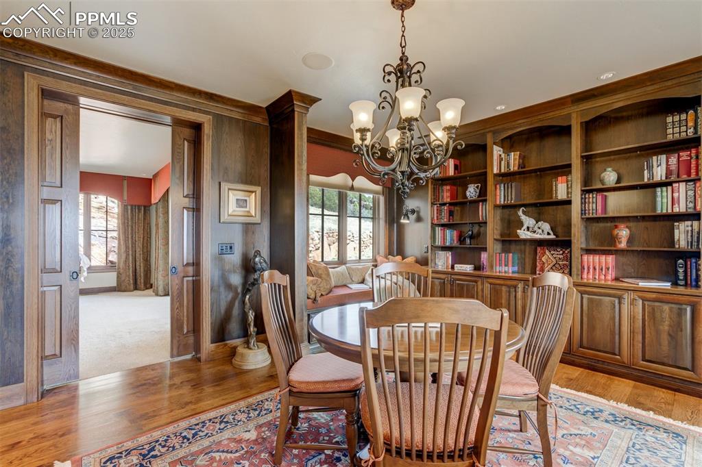 Image 9 of 50: Study/library game area in living room