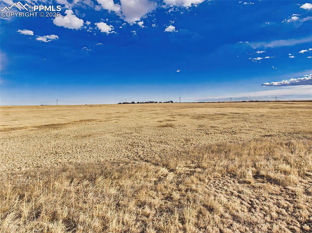 Image 4 of 12: Lot View – Level Prairie Terrain – Wide-angle view across gently level grou