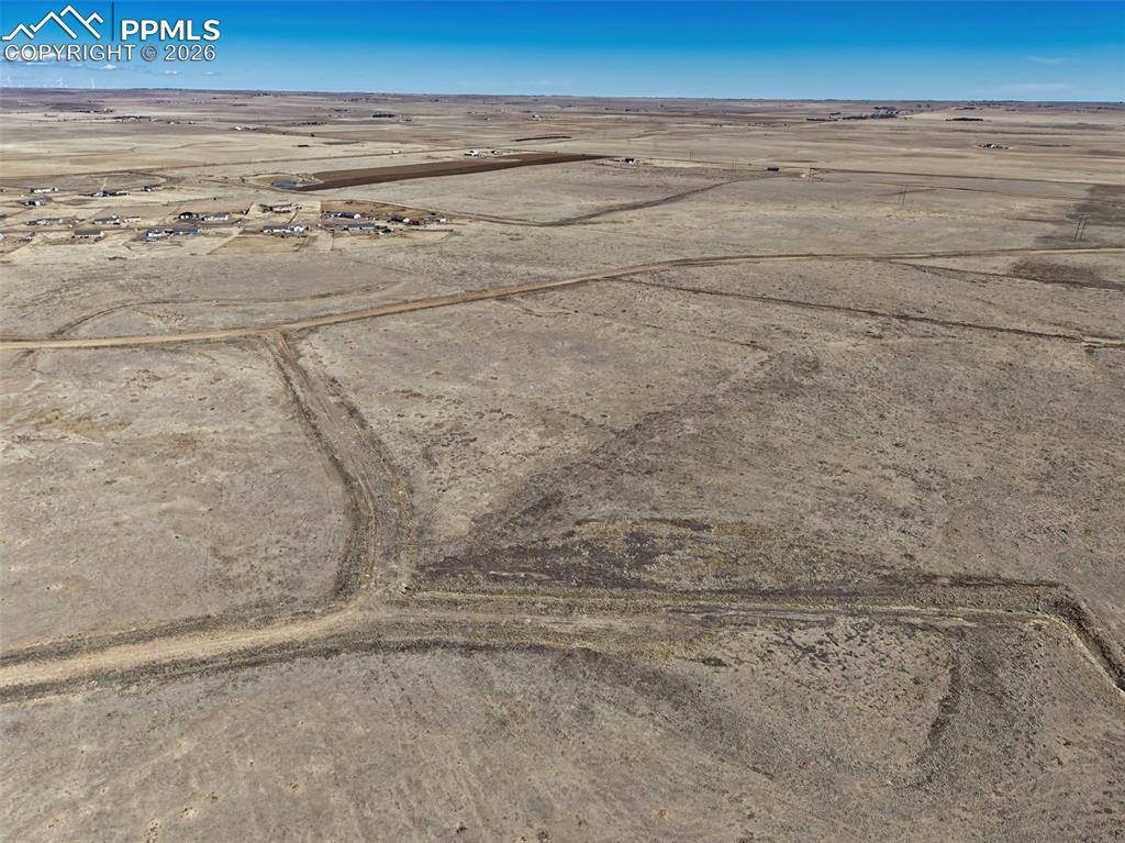 Image 5 of 12: Aerial View – Drive Access & Boundaries – High-angle view illustrating the 