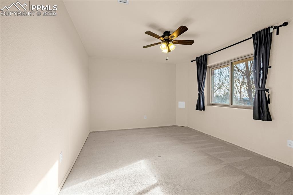 Image 35 of 50: basement bedroom