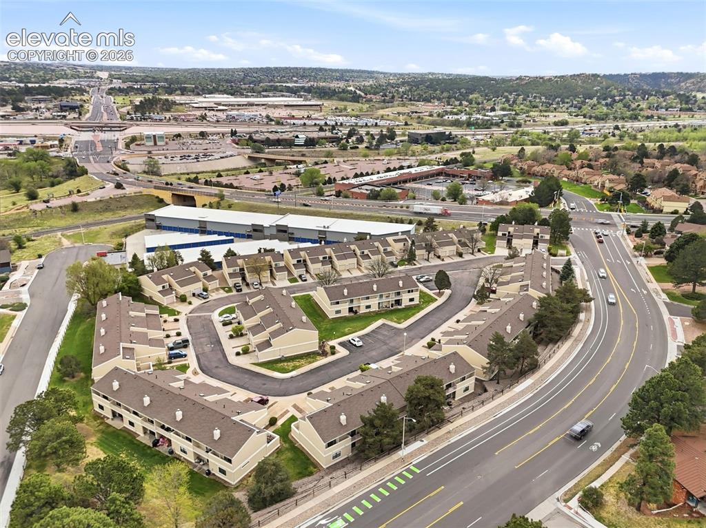 Image 47 of 50: Aerial perspective of a multi-unit residential community featuring uniform