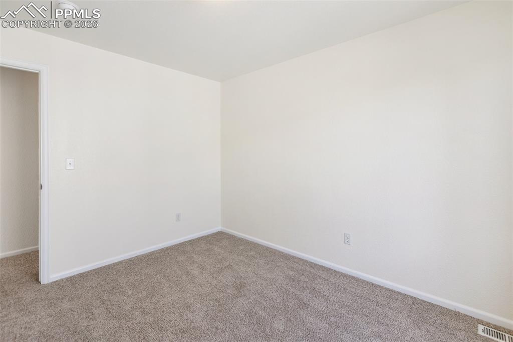 Image 32 of 37: Bedroom