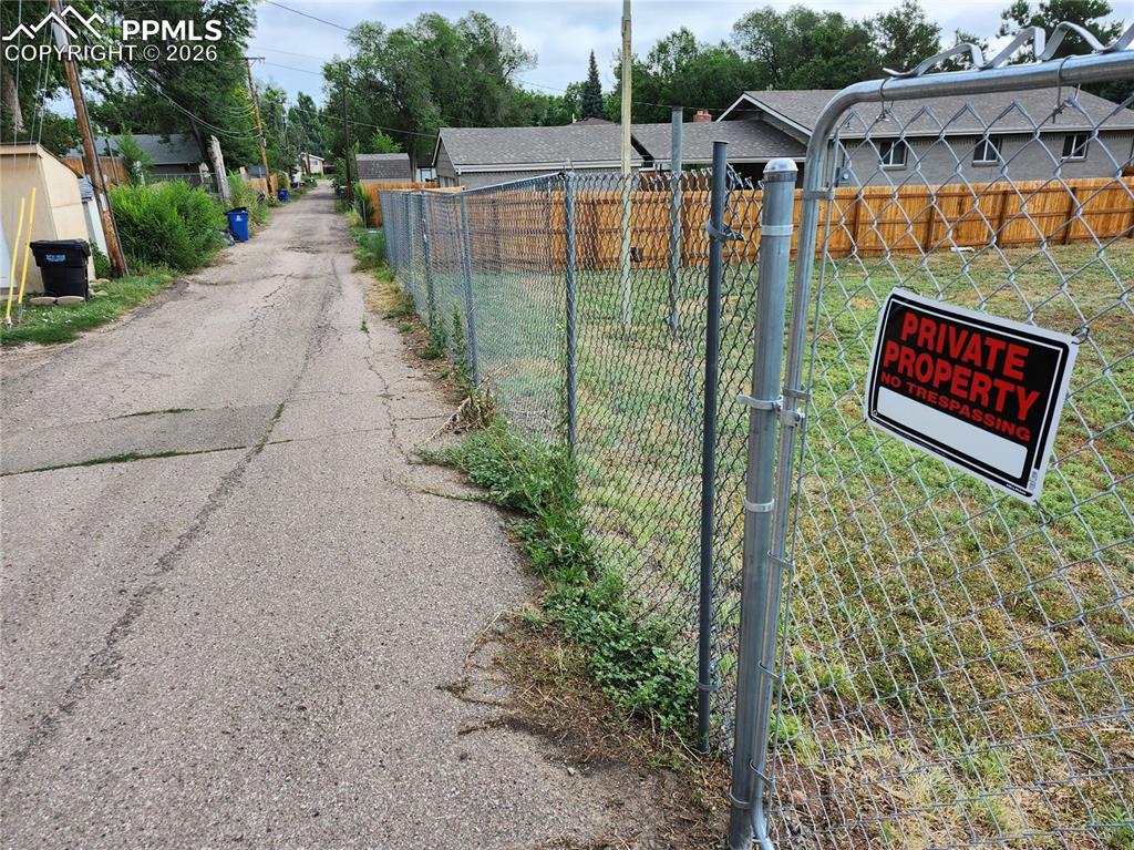 Image 4 of 6: Alley way at rear of property