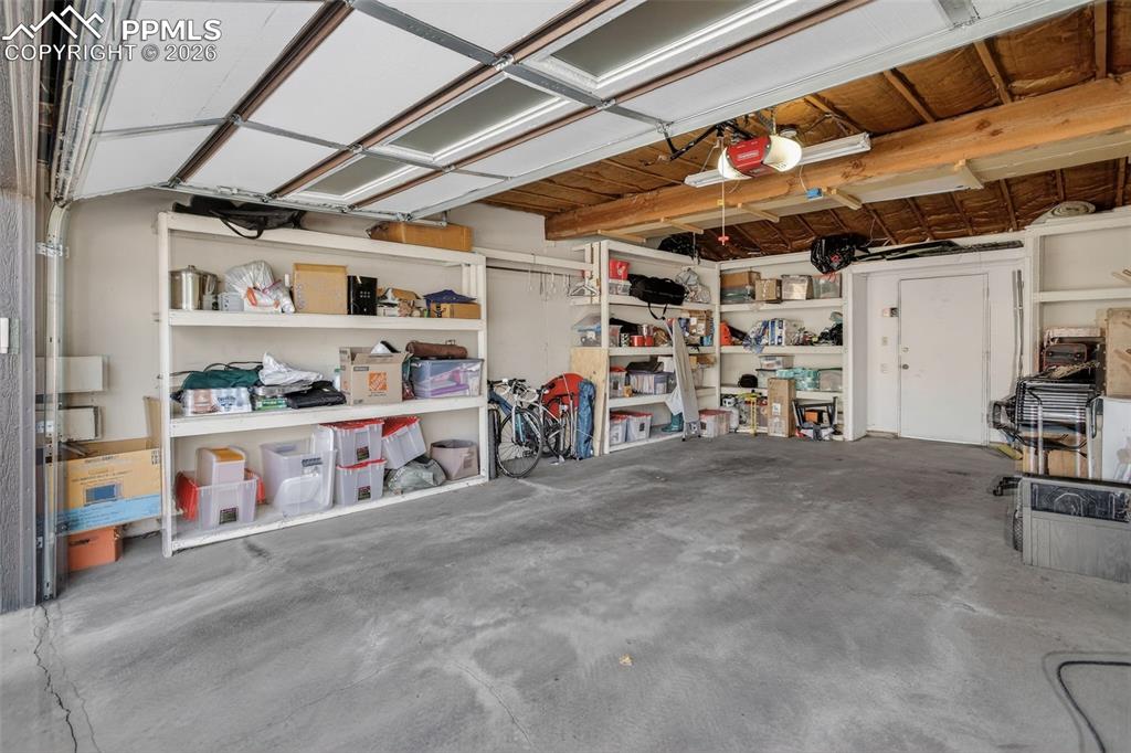 Image 25 of 29: Built-in shelving is included and adds additional storage space