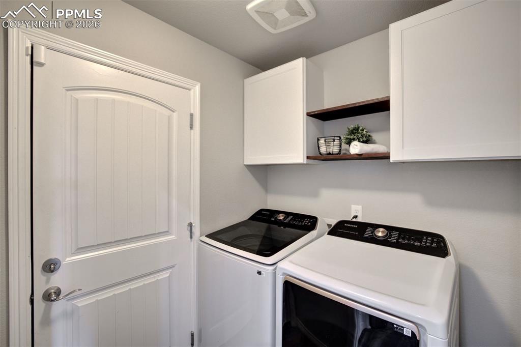 Image 30 of 50: Main floor laundry