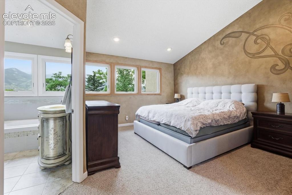 Image 21 of 50: Master Bedroom